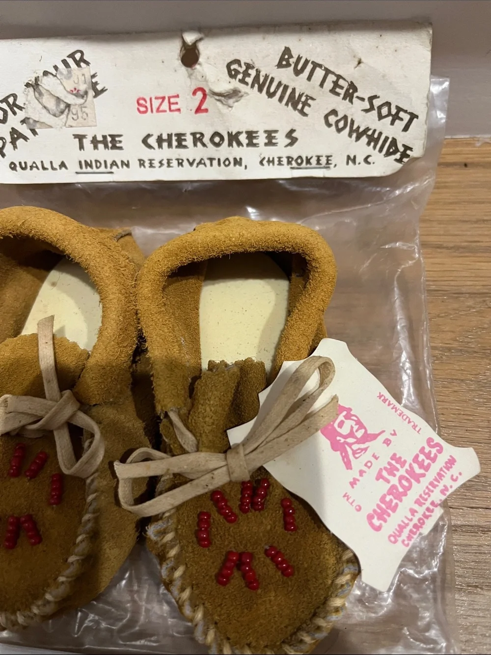 Cherokee Kids Butter-Soft Suede Moccasins in Mustard with Red Bead Detail
